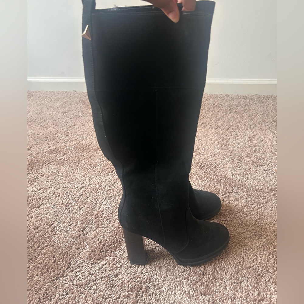 Black high heeled boots